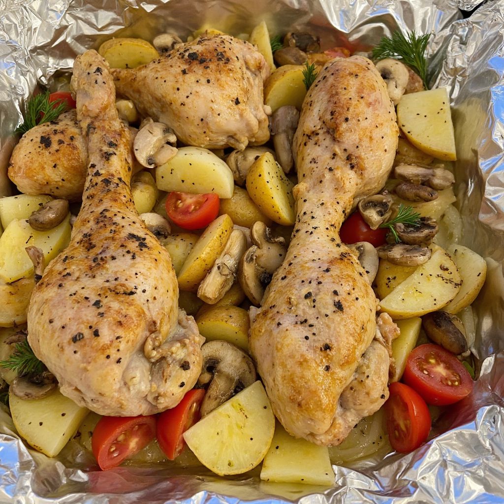 Куриные бедра с картофелем в духовке